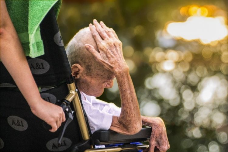 Elderly Man in Wheelchair